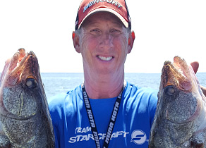 Gary Zart holding two fish