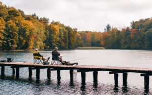 Two men fishing in the fall.