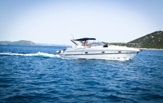 Motorboat in the water. Maintenance ensures your boat will last longer and perform better!